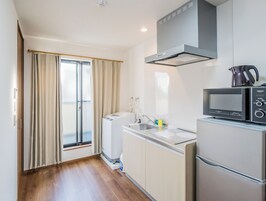 Quarto casal superior, para não fumantes | Cozinha privada | Geladeira, micro-ondas, cooktop, chaleira elétrica