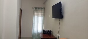 Chambre Double, vue ville | Coin séjour