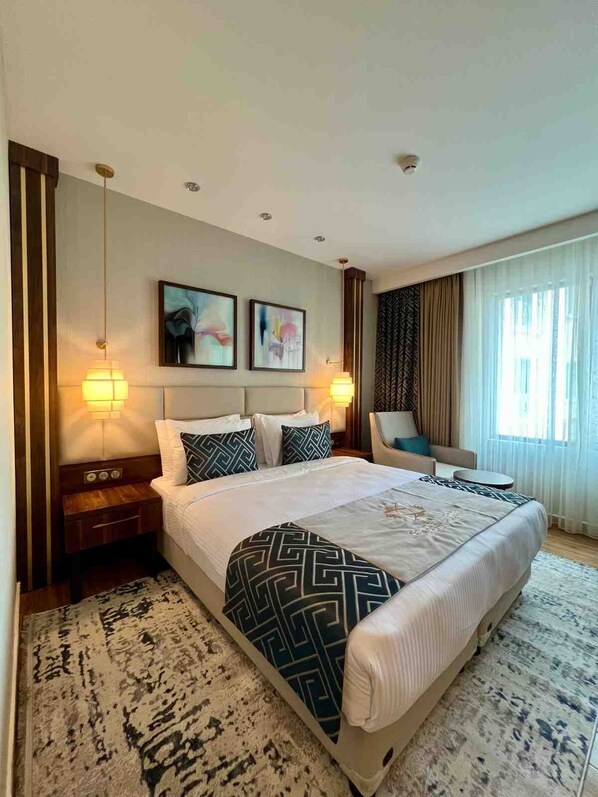 In-room safe, desk, laptop workspace, blackout curtains