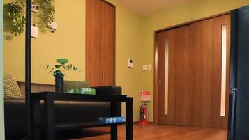 Standard Double Room, Non Smoking | Living room | Flat-screen TV