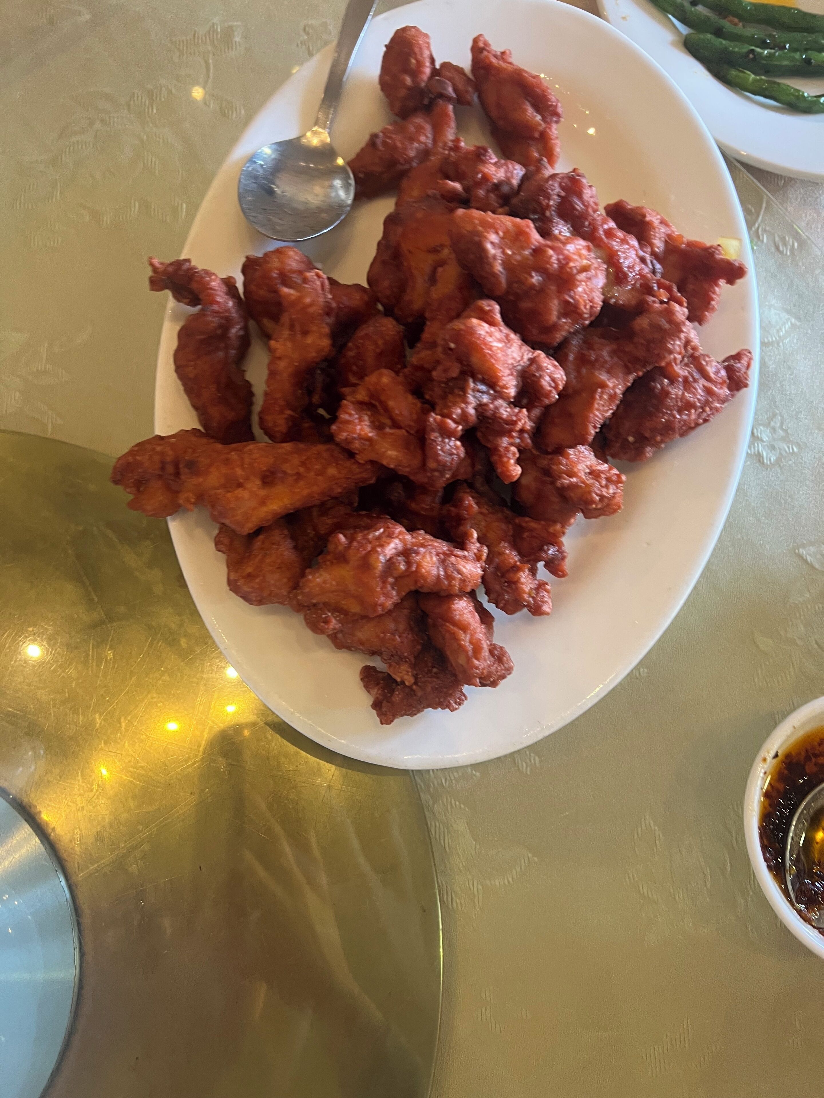 A plate of fried chicken on a table.