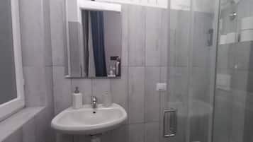 Comfort Quadruple Room, Multiple Beds, Mountain View | Bathroom | Free toiletries, hair dryer, towels, soap