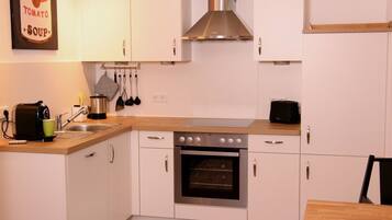 Réfrigérateur, four, plaque de cuisson, lave-vaisselle