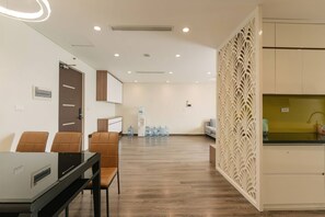 Premium Apartment, 2 Bedrooms, Balcony, City View | Living area | 42-inch Smart TV with cable channels