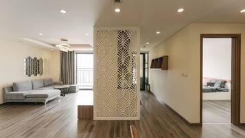 Premium Apartment, 2 Bedrooms, Balcony, City View | Living area | 42-inch Smart TV with cable channels