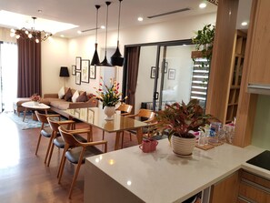 Deluxe Apartment, 3 Bedrooms, Balcony, City View | Living area | Smart TV - Imperia Garden Apartments - Heart of City (Hanoi)