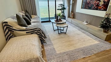 Superior Apartment, 3 Bedrooms, Kitchen, City View | Living area | 35-inch TV with digital channels