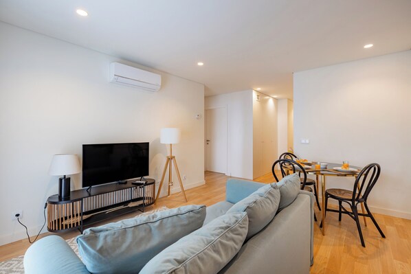 City Apartment, 1 Bedroom, Non Smoking | Living area | 32-inch TV with cable channels