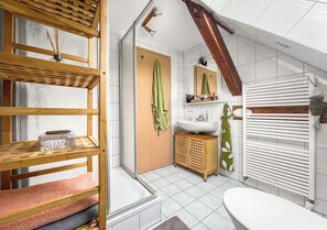 Shower, eco-friendly toiletries, hair dryer, towels