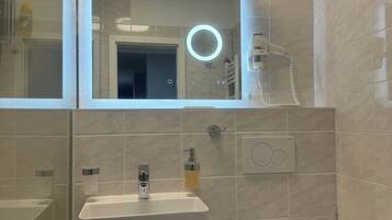 Standard Studio, 2 Twin Beds, Kitchenette, Courtyard View | Bathroom | Shower, rainfall showerhead, hair dryer, soap