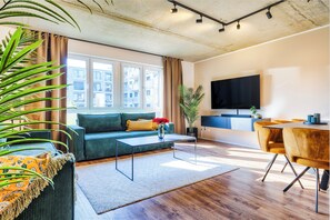 65-inch Smart TV with digital channels, heated floors