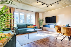 65-inch Smart TV with digital channels, heated floors