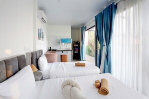 Chambre Junior double ou avec lits jumeaux, vue sur la plage, en face de la plage | Système d’insonorisation, accès au Wi-Fi (inclus), literie fournie