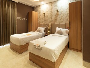 Superior Twin Room | Blackout drapes, iron/ironing board, free WiFi, bed sheets - Orsom Stays Elite Sector 53 (Gurugram)
