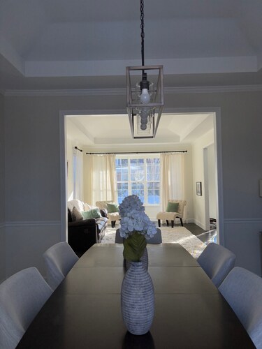 Large, comfortable 5-bedroom home with WiFi, AC, stocked kitchen and back yard