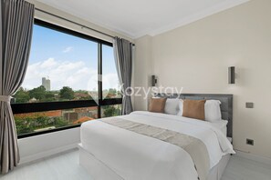 Departamento, 3 habitaciones, balcón, vista a la ciudad | 3 habitaciones, tabla de planchar con plancha y wifi gratis 