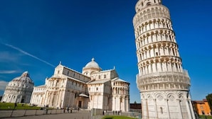 The Leaning Tower of Pisa with the adjacent cathedral and dome in the background. - Window To The Tower (Pisa)