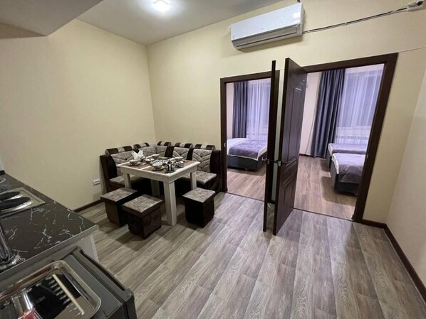 Comfort Apartment | Living area | TV
