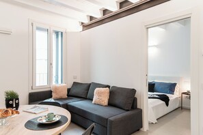 Comfort Apartment, City View | Living area | LED TV - Suite JOIVY Lake 11 (Como)