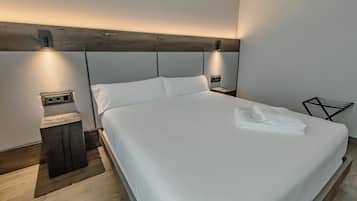 Coffres-forts dans les chambres, fer et planche Ă  repasser