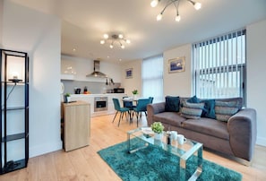 Appartement Confort | Cuisine privée | Chaise haute