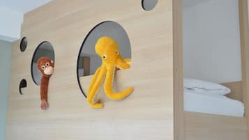 Family Quadruple Room, Courtyard View | In-room safe, laptop workspace, blackout curtains, soundproofing