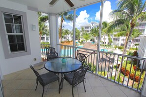 Outdoor dining - Elegantly Decorated Condo with Pool View! (Bonita Springs)