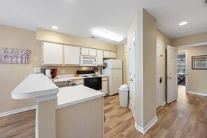 Condo, 2 Bedrooms | Private kitchen | Fridge, oven, coffee/tea maker, toaster