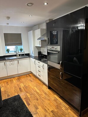 Apartment | Private kitchen | Fridge, microwave, oven, stovetop