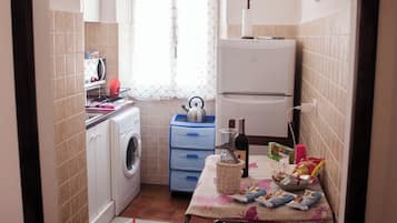 Condo, City View | Private kitchen | Electric kettle, toaster