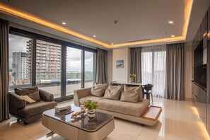 Premium Apartment, Balcony, City View | Living area | Flat-screen TV - Kass Towers (Accra)