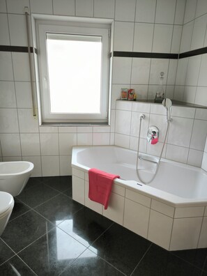 Hair dryer, bidet, towels, soap