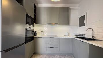 Luksusleilighet, byutsikt | Eget kjøkken