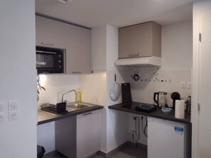 Een magnetron, een oven, een kookplaat