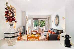Family Apartment, 2 Bedrooms, Non Smoking | Living area | 32-inch TV with cable channels