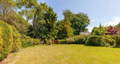 Lawhead Road is a beautifully renovated, pet-friendly home in St. Andrews, offering a peaceful retre