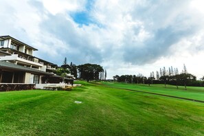 A tapestry of green fairways and slender pines creates a timeless backdrop for leisurely mornings and scenic evening strolls    