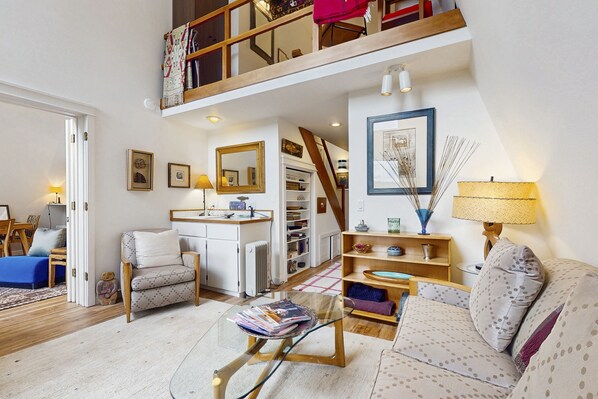 TV, fireplace, books