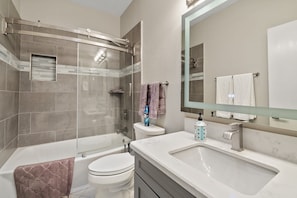 Shower, towels, toilet paper