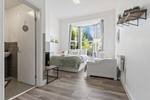1 bedroom, desk, iron/ironing board, travel cot