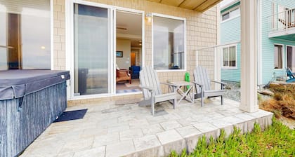 Modern oceanfront home with private hot tub, patio, & gas fireplace