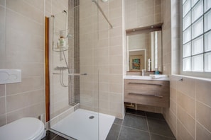 Shower, hair dryer, towels, soap