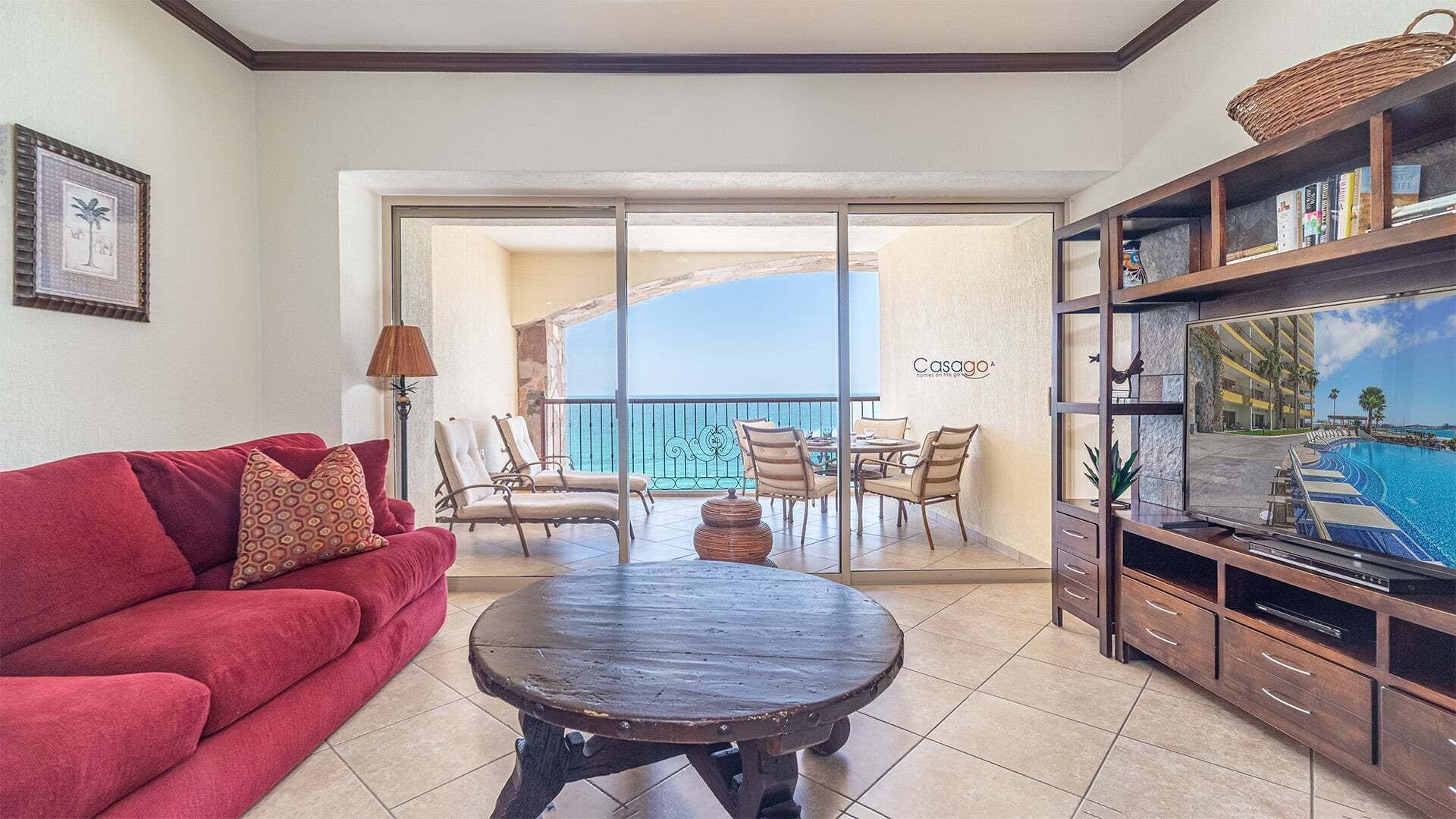 Condo, 1 cama King size y sofá cama, balcón, vista al océano (Sonoran Sky SKY 1105) | Área de sala de estar | Televisión de pantalla plana de 42 pulgadas con canales digitales 