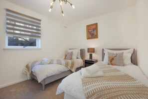 2 bedrooms, desk, iron/ironing board, travel crib
