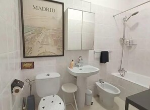 Hair dryer, bidet, towels, soap