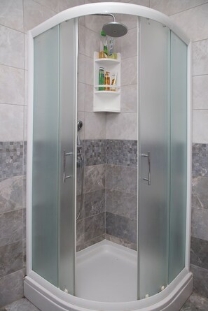 Shower, free toiletries, hair dryer, towels