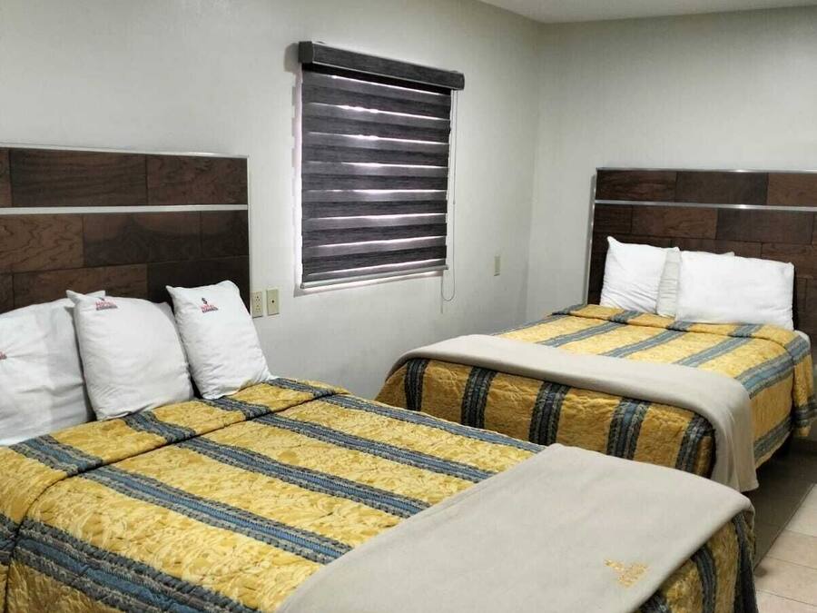 Economy Triple Room, Patio, City View | Laptop workspace, free WiFi