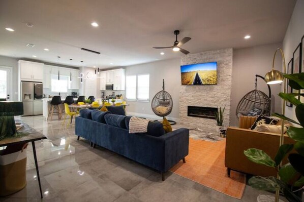 Smart TV, fireplace, books