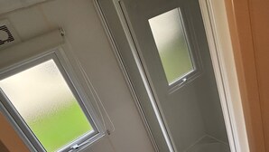 A room with a window and a door. - Beautiful Caravan Phoenix In St Margaret's Bay. Pet Friendly (Saint Margaret's at Cliffe)