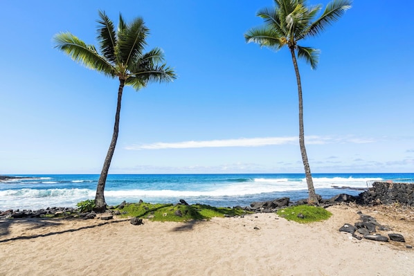On the beach, sun loungers, beach towels
